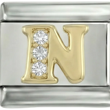 Buchstabe N in Gold mit Steinen, in Silber